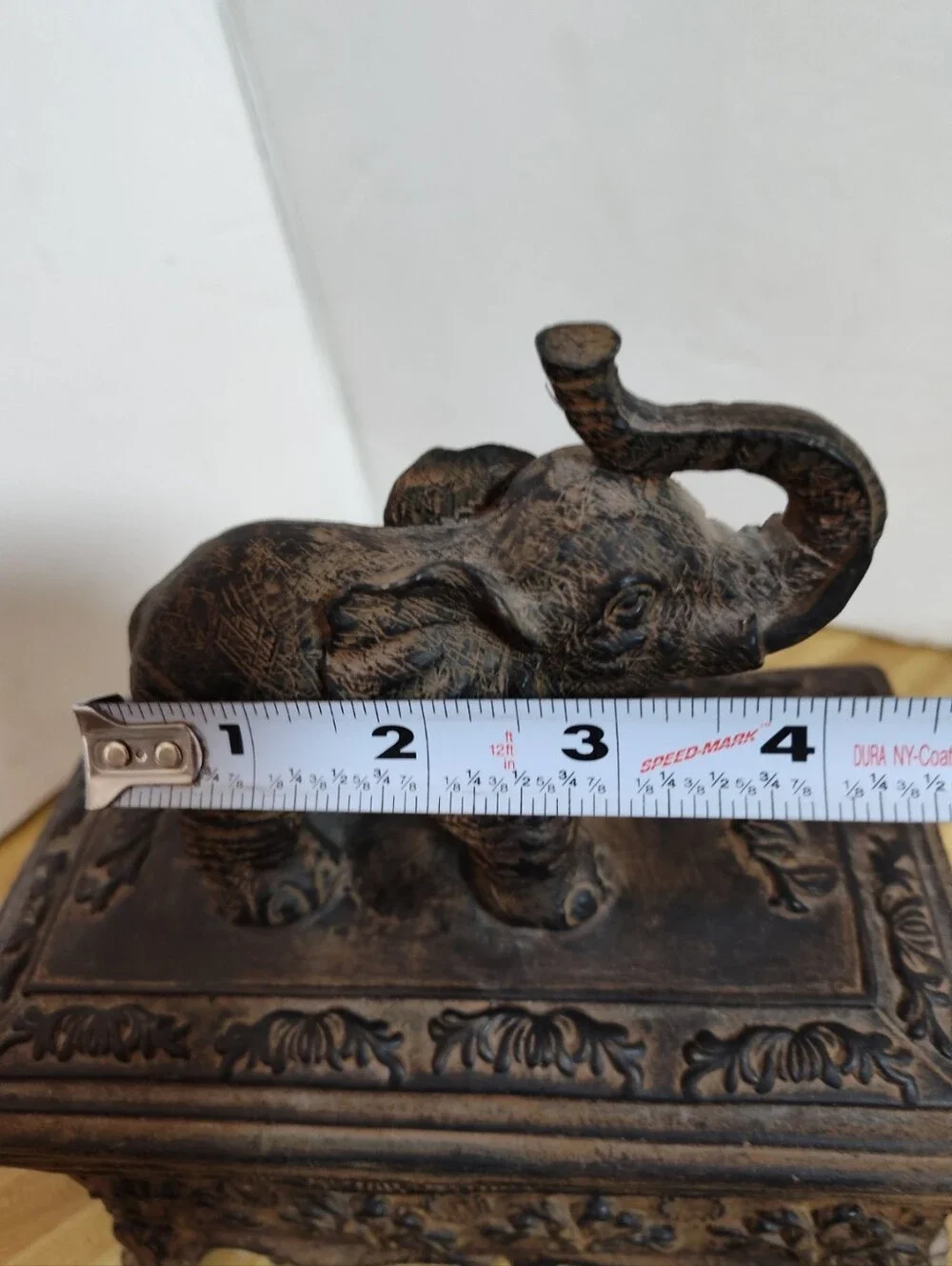Ornate elephant trinket/jewelry box with raised elephant lid, floral relief desi